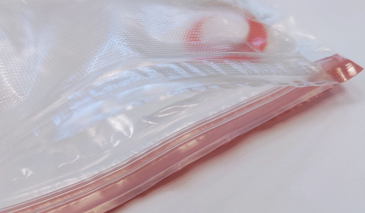 Dual-lock zipper closure on reusable food vacuum bag
